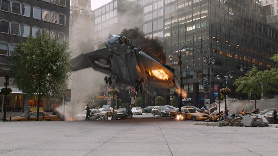 The Quinjet carrying several of the Avengers crashes after being shot by aliens.
