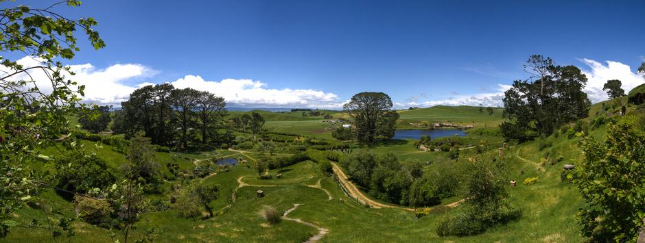 Panorama looking down over Hobbiton from the pathway along the hill leading to Bag End.