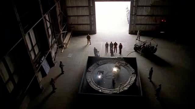 An Area 51 crew welds a permanent iris onto the beta Stargate.