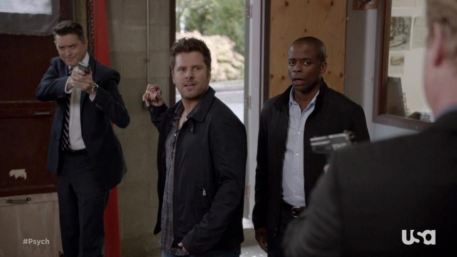 Shawn, Gus, and Lassiter are in a Mexican standoff with the FBI agent.