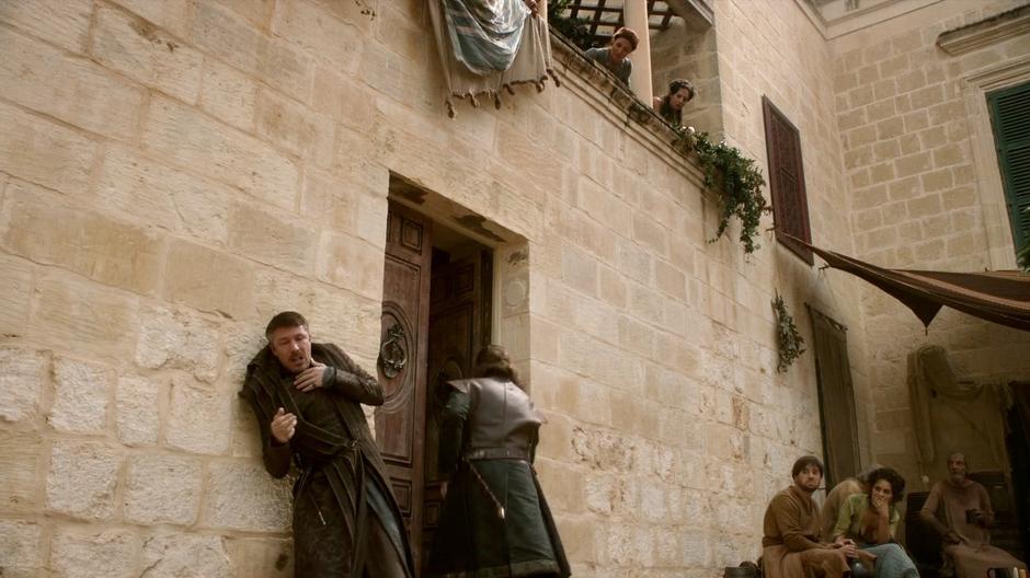 Ned releases Littlefinger after realizing Catelyn is actually in the brothel.