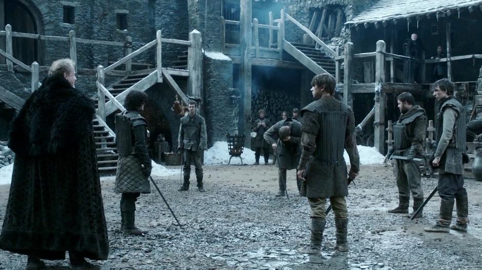 The Night's Watch initiates stand in a circle after sparring.