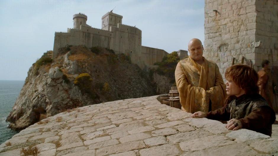 Tyrion and Lord Varys talk about the defense of the city. Fort Lovrijenac can be seen in the background.