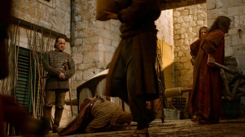 Bronn looks at Lancel after he stumbles out of the litter.