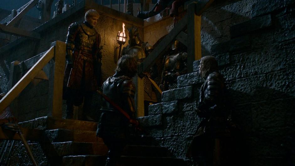 Tyrion talks to Joffrey about defending the city on the stairs leading to the wall.