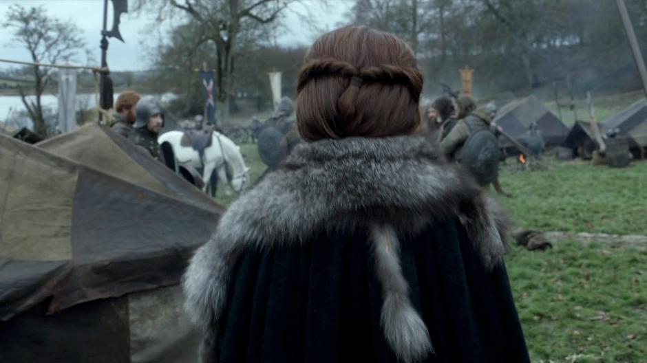 Catelyn walks through camp after learning of Ned's death.