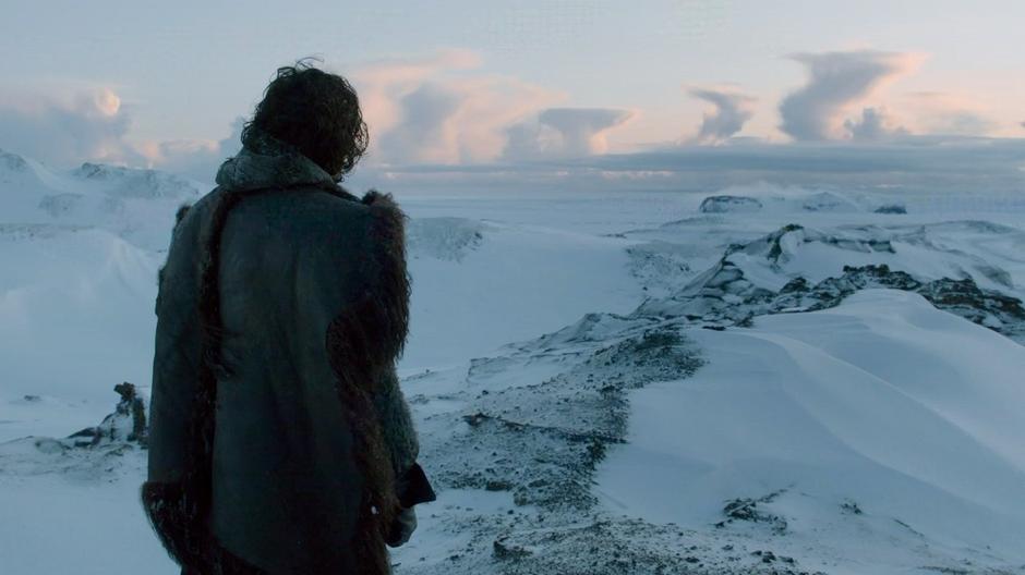 Jon Snow looks out across the landscape.