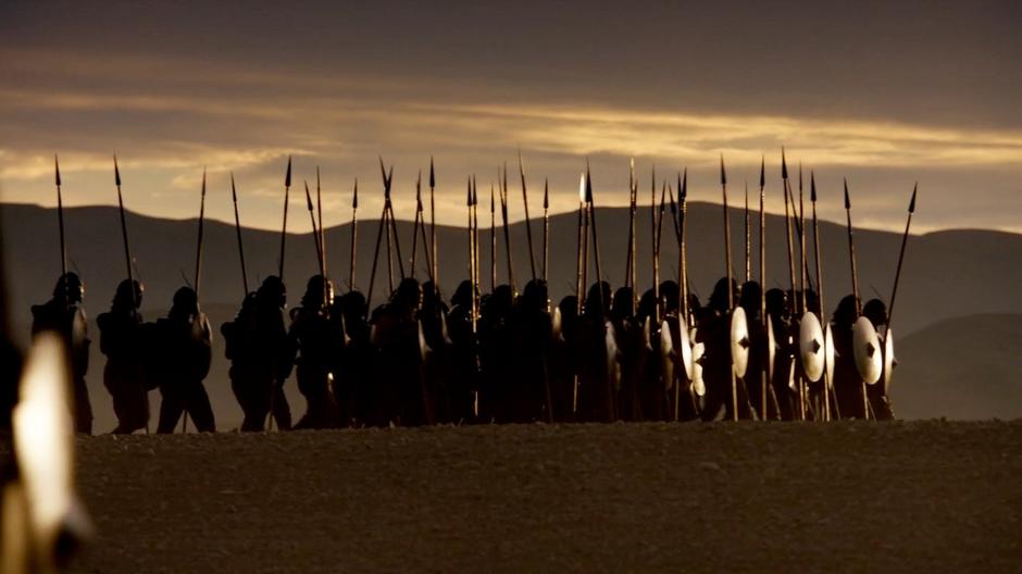 THe Unsullied walk out of Astapor into the sunset.