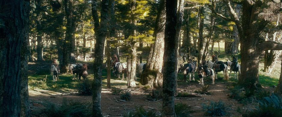 Members of the company prepare the ponies provided by Beorn.