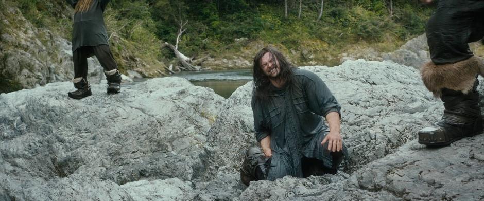 Kili collapses from his injured leg.