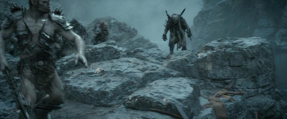 Orcs find the location where the dwarves exited the river.