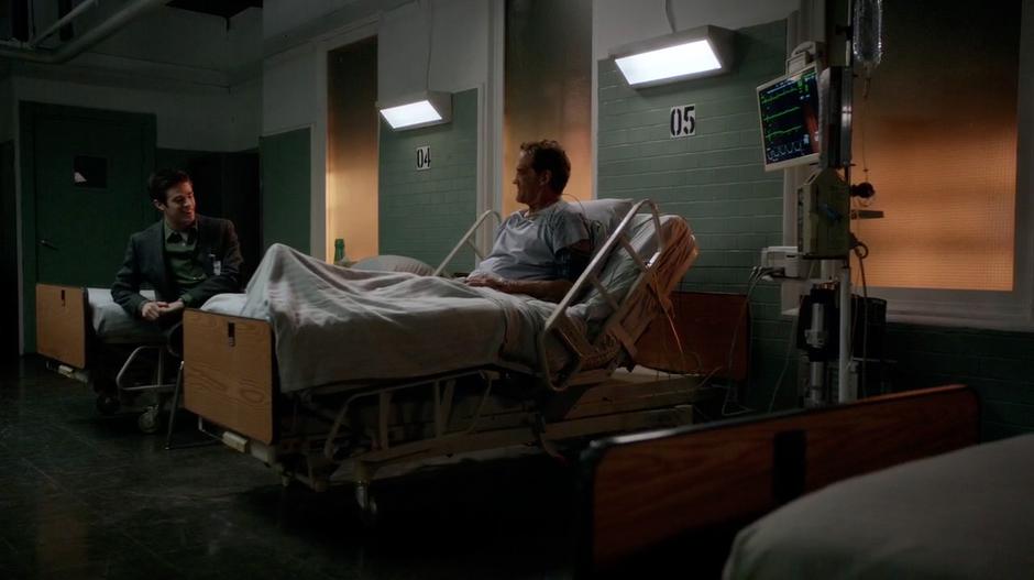 Barry and his father talk in the hospital after the case is wrapped up.