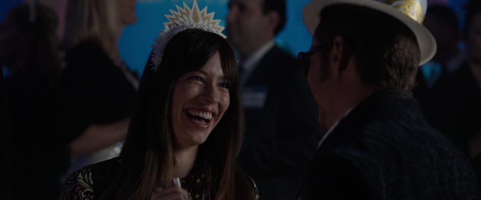 Maya Hansen laughs at one of Tony Stark's jokes.