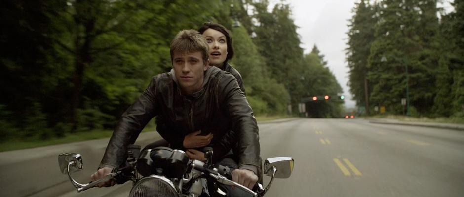 Sam and Quorra ride Sam's motorcycle at the end of the movie.