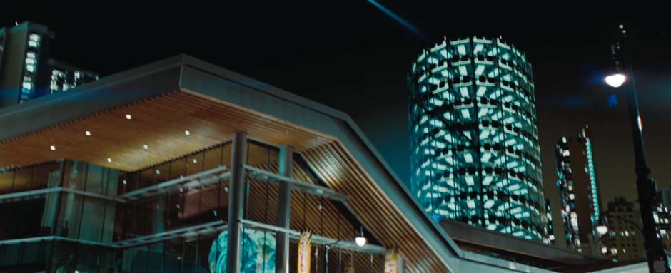 Photo of the Vancouver Convention Centre appearing as India with the finale's multistory automated parking garage digitally added to the background.