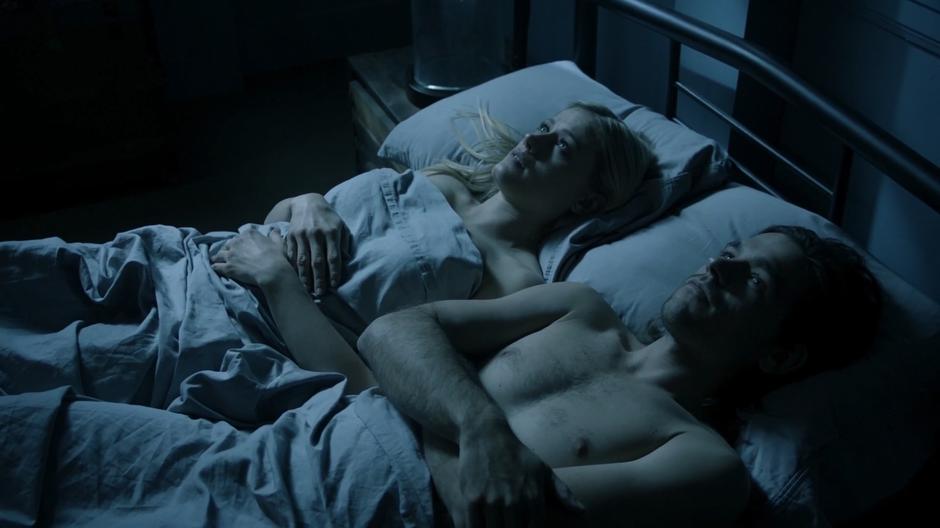 Quentin and Alice lay in bed naked after having a bit of sex.