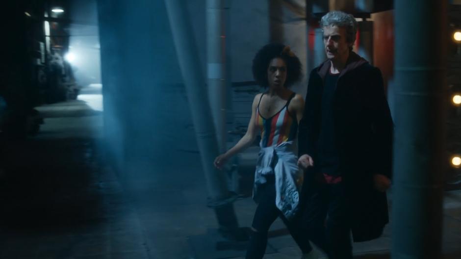 Bill and the Doctor leave the cryo chamber after examining the frozen crew.