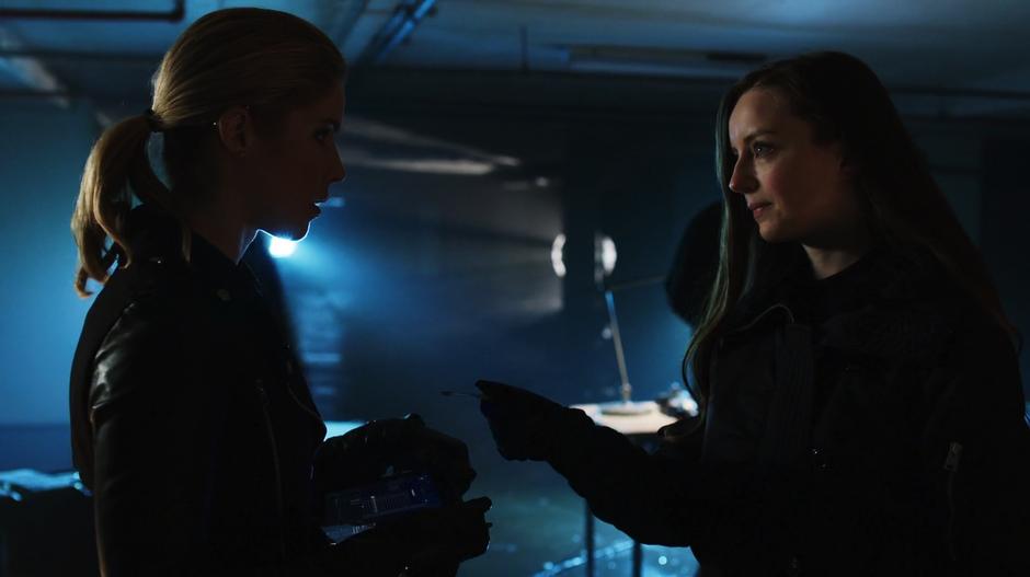Alena hands Felicity one of the A.R.G.U.S. access keys.