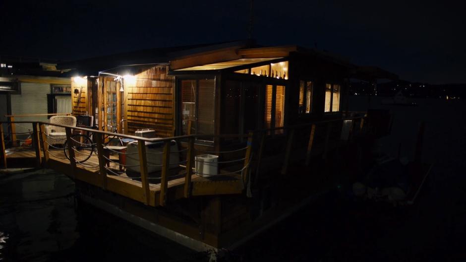 Bug's houseboat sits in the dark.