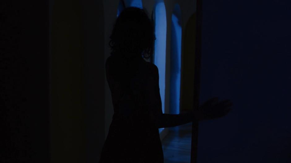 Kala walks out of her bedroom in the middle of the night.