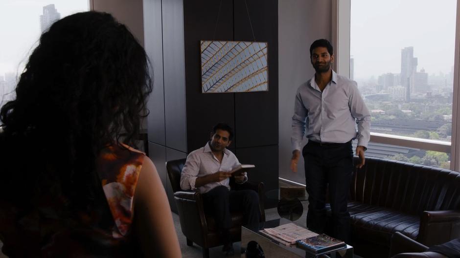 Kala enters Rajan's office to find him in a meeting with Ajay.