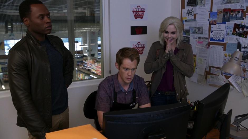 Liv reacts with glee at the footage of the slapping while Tim shows it to her and Clive.