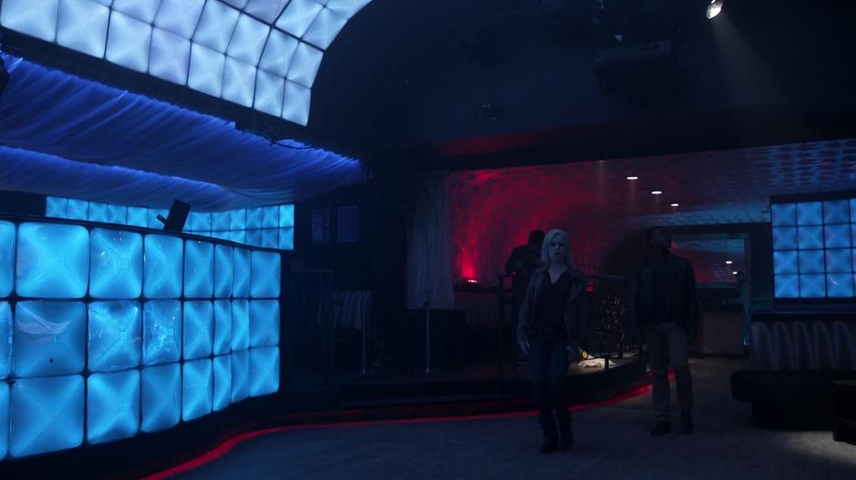 Liv and Clive enter the empty nightclub.