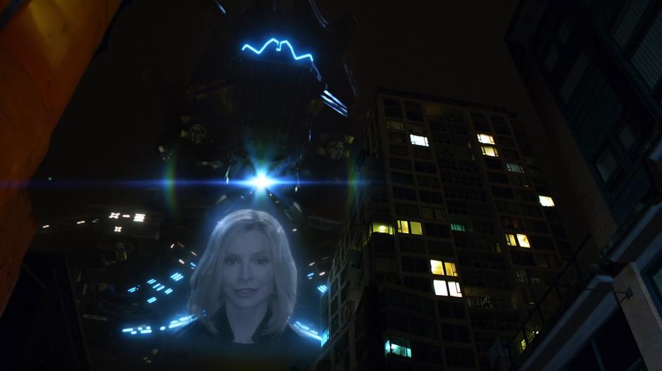 Cat Grant appears in the hologram beneath the Daxamite mothership telling people to fight back.