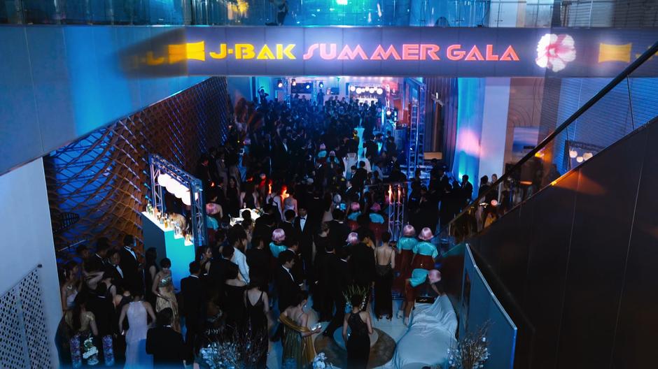 People mill around on the ground floor of the gala.