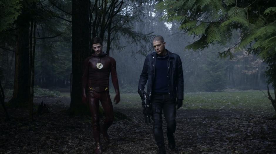 Barry and Snart walk back to the Wave Rider after the heist.