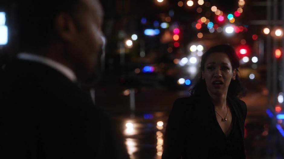 Iris looks to her father with tears in her eyes after Barry leaves.