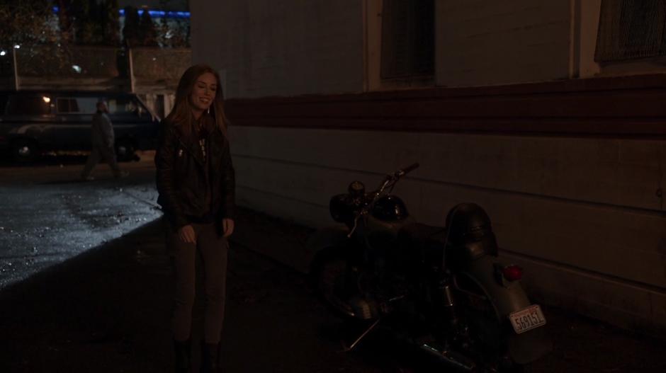 Rachel Greenblatt shows Ravi her motorcycle and offers a ride.