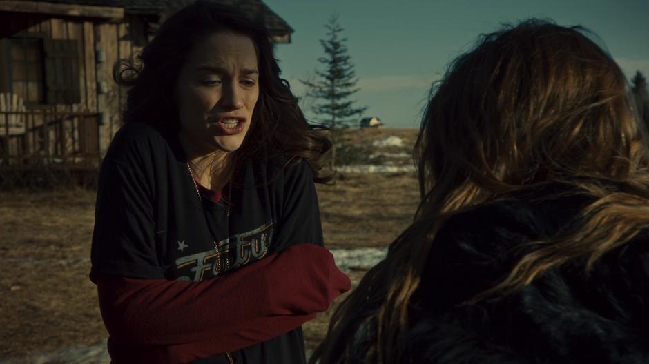 Wynonna shivers while talking to Waverly after giving her sister her coat.