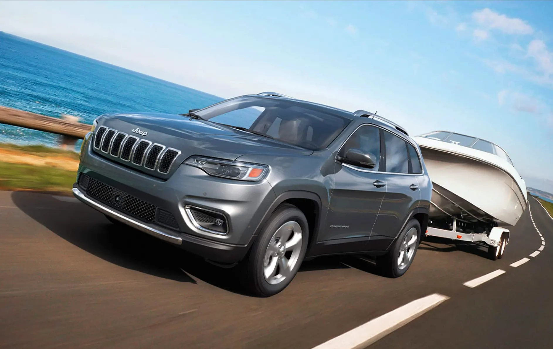 2021 Jeep Cherokee The 2021 Jeep Cherokee towing a boat
