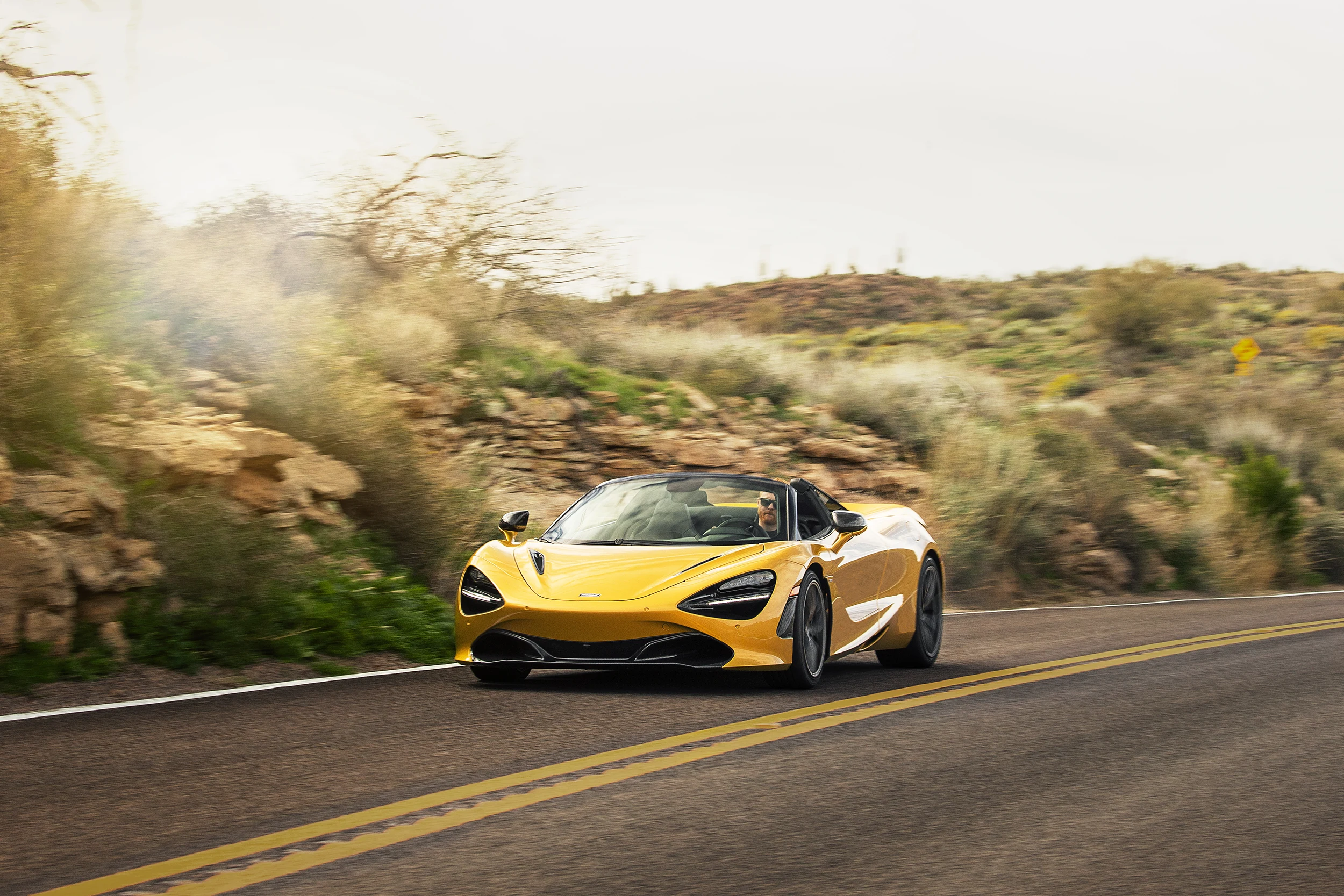 McLaren Boston 720S Spider Yellow 720S Spider driving on road