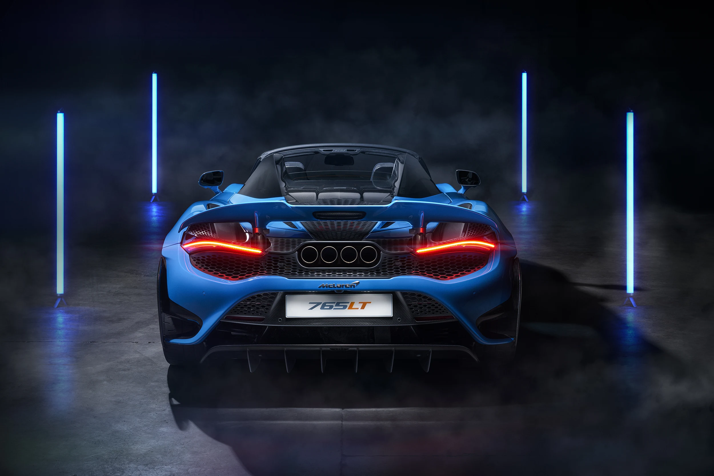 McLaren Boston 765LT Spider Rear of blue 765LT Spider in dark room