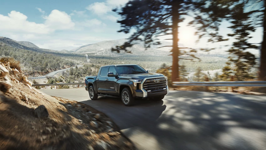 2022 Toyota Tundra Exterior view of Tundra driving outside on a nice day
