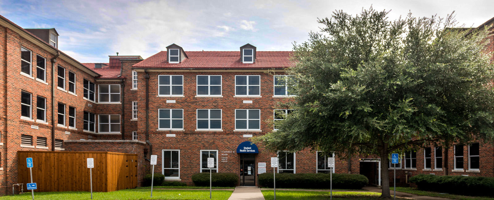 A brick building where the student health services is located.