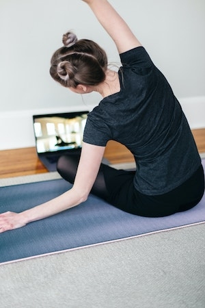 Woman exercising online session