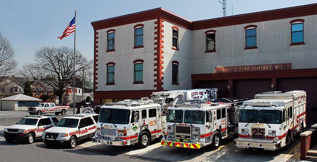 fire trucks parked out front of the lititz fire company