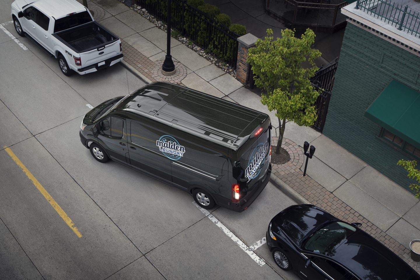 black 2020 ford transit parallel parking using ford's active park assist