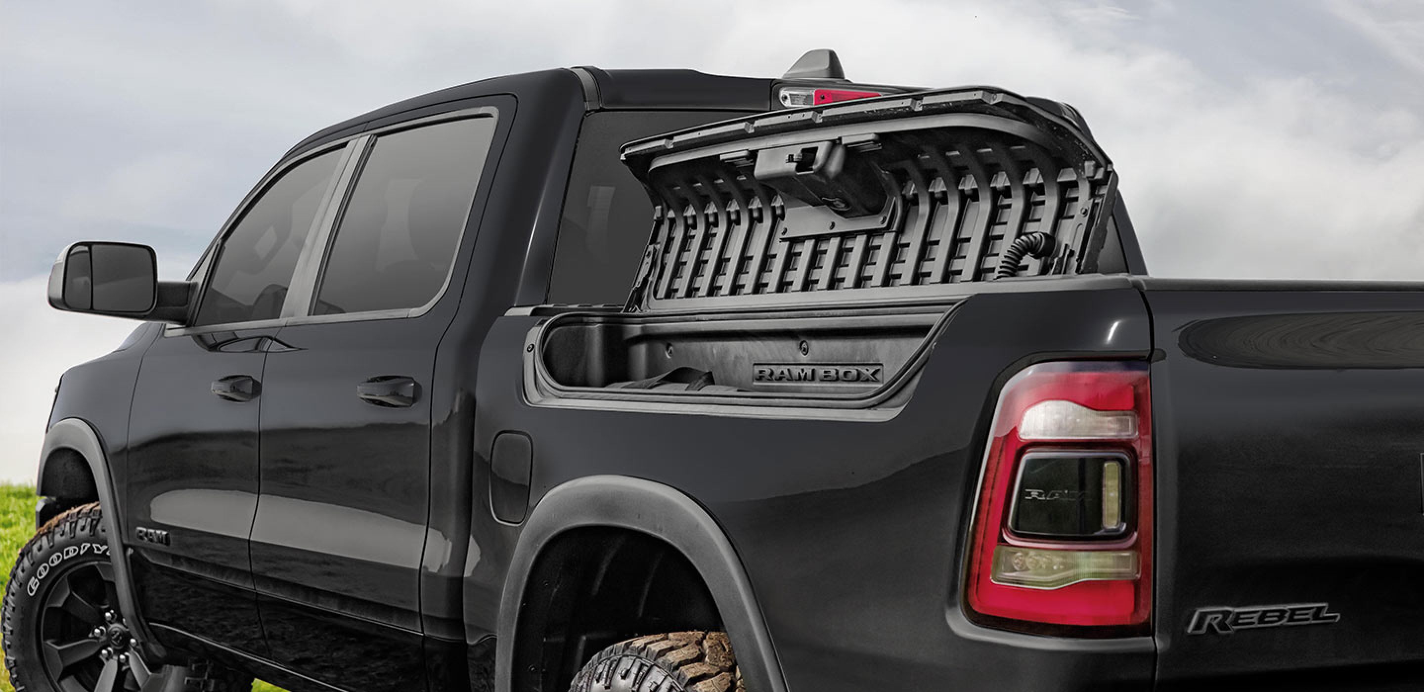 a black 2020 ram 1500 rebel with the rambox cargo management system