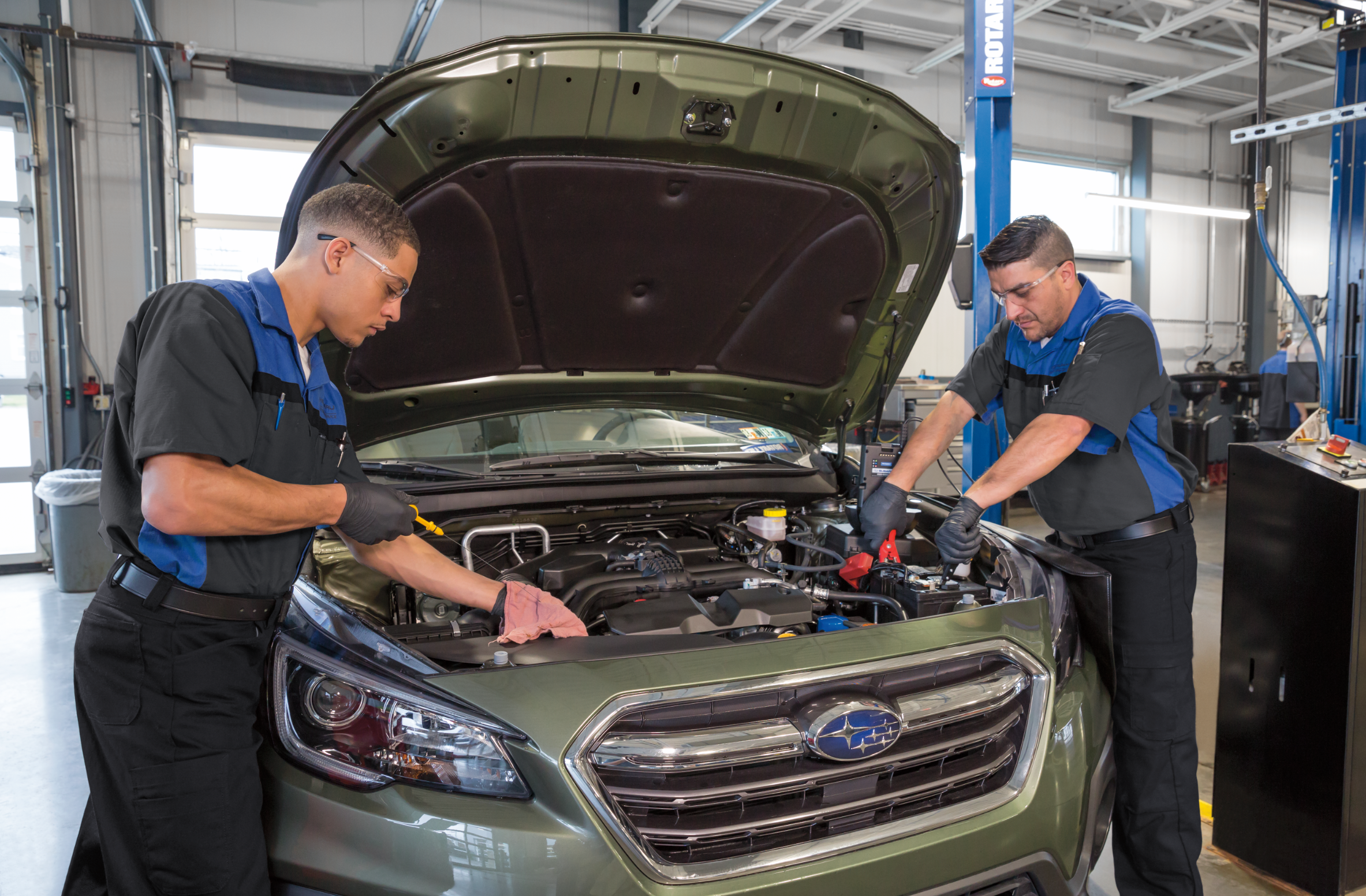 silver 2019 subaru outback driving up a mountain