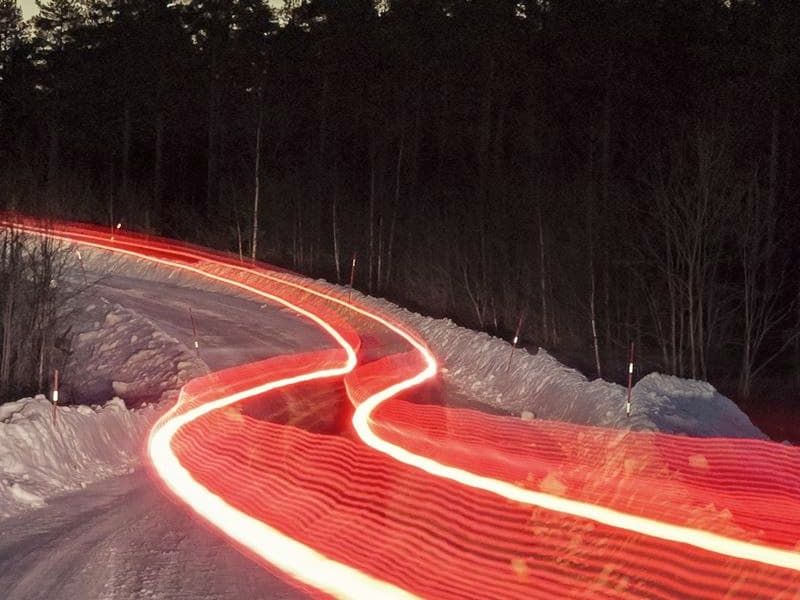 tail lights on a snowy road