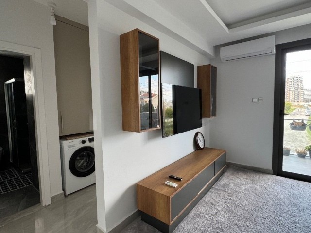 LONGBEACH BÖLGESİNDE  2+1  FULL EŞYALI  YENI APARTMAN