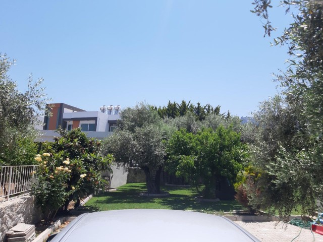 A DETACHED DUPLEX VILLA WITH AN EQUIVALENT COB, FIREPLACE, BARBECUE, GARDEN WITH AN INDOOR AREA OF 4 + 1, 290 SQUARE METERS ON A CORNER PLOT OF 600 SQUARE METERS WITH A FACADE Decking OUT ON BOTH SIDES, IN A VERY GOOD LOCATION IN KYRENIA ** 