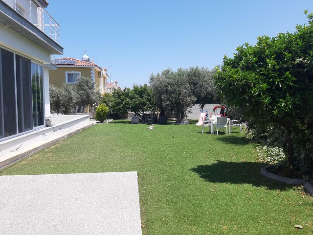 A DETACHED DUPLEX VILLA WITH AN EQUIVALENT COB, FIREPLACE, BARBECUE, GARDEN WITH AN INDOOR AREA OF 4 + 1, 290 SQUARE METERS ON A CORNER PLOT OF 600 SQUARE METERS WITH A FACADE Decking OUT ON BOTH SIDES, IN A VERY GOOD LOCATION IN KYRENIA ** 