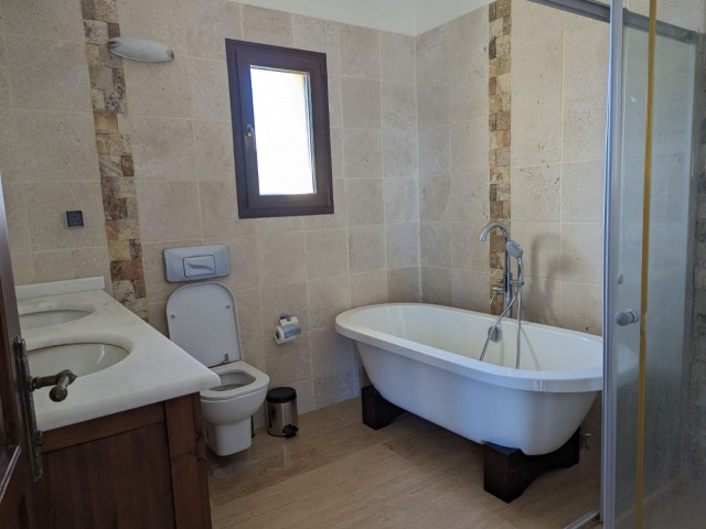 IN ESENTEPE, IN A SEAFRONT LOCATION, WITH EQUIVALENT KOÇANLI, ON A LAND OF 2800 SQUARE FEET SIZE OF 3 EVLEK, WITH 350 SQUARE METERS CLOSED AREA, 4+1, 3 ROOMS WITH ENSUIT, 4 BATHROOMS WITH TOILET, 6X12 SWIMMING POOL IN THE GARDEN, OVEN AND A UNIQUE SEA WITH A BBQ DETACHED, DUPLEX, LUXURY VILLA WITH A