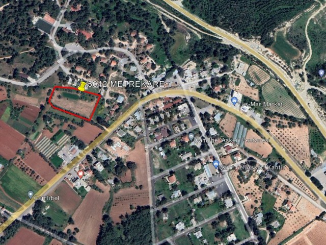 LAND IN ÇAMLIBEL, 5042 SQUARE METERS, OPEN FOR CONSTRUCTION, WITH ROAD, WATER AND ELECTRICAL INFRASTRUCTURE, ON THE MAIN ROAD PASSING WITHIN THE VILLAGE AND THROUGH THE VILLAGE CENTER, AND IN A GOOD LOCATION