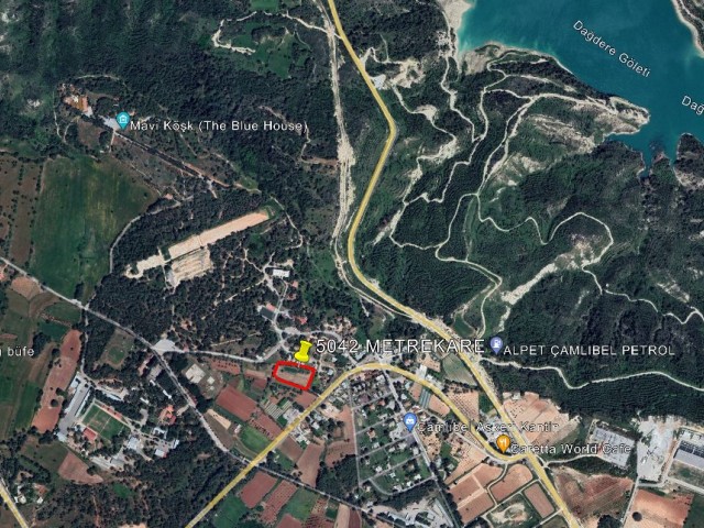 LAND IN ÇAMLIBEL, 5042 SQUARE METERS, OPEN FOR CONSTRUCTION, WITH ROAD, WATER AND ELECTRICAL INFRASTRUCTURE, ON THE MAIN ROAD PASSING WITHIN THE VILLAGE AND THROUGH THE VILLAGE CEN